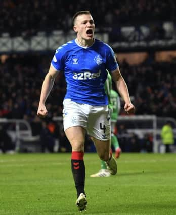 George Edmundson celebrates scoring Rangers equaliser against Hibs on Wednesday. I felt Id redeemed myself he said. Picture: SNS.